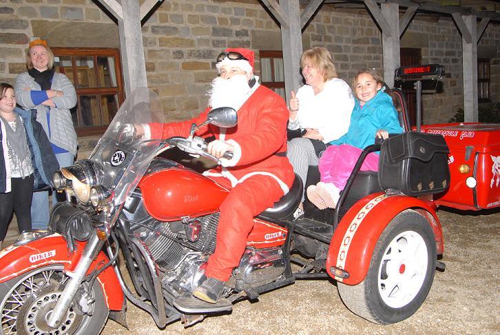 Having a go on Santa's Trike